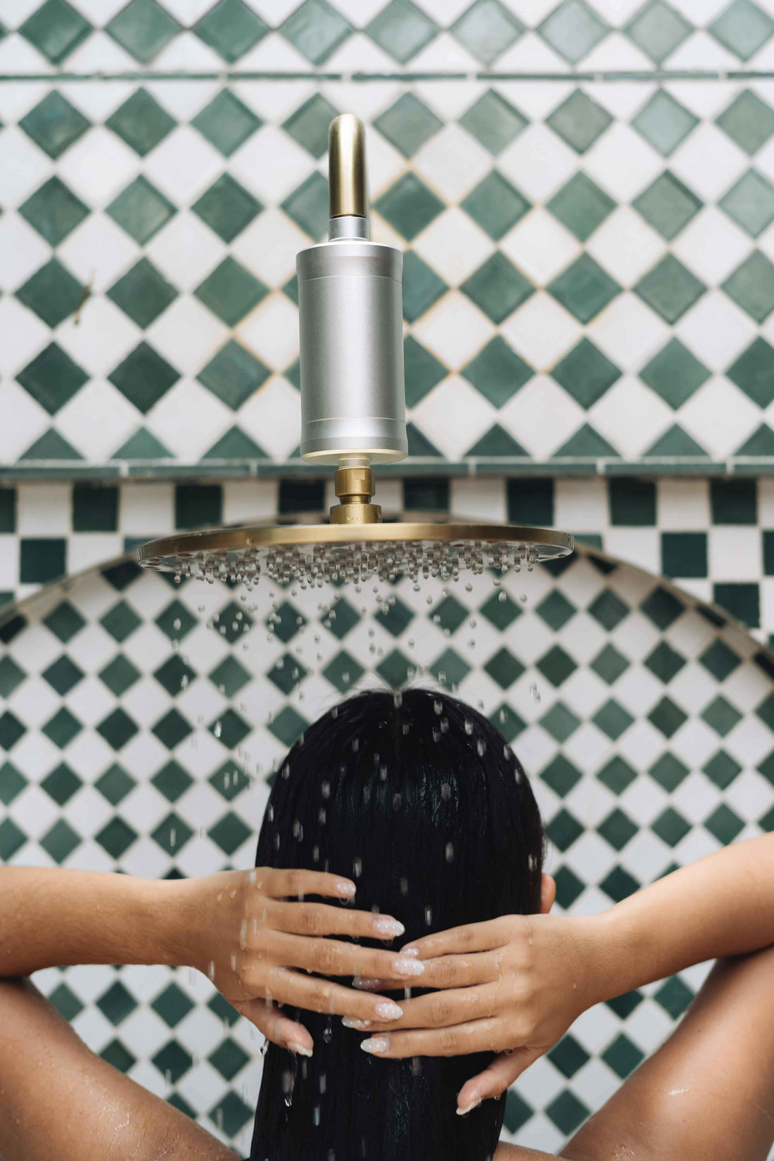 The Vida Pura Shower Filter on an outdoor shower