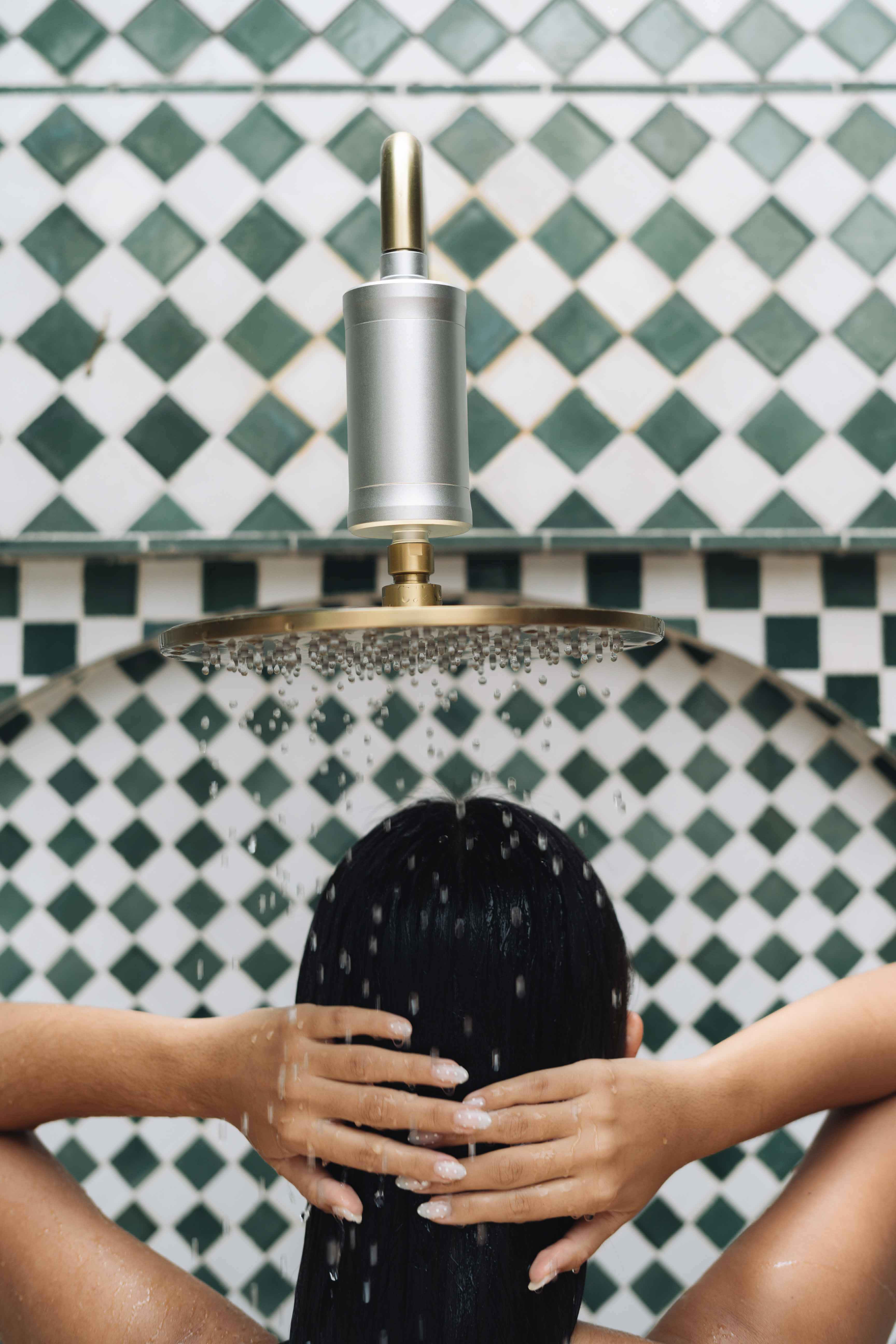 The Vida Pura Shower Filter on an outdoor shower