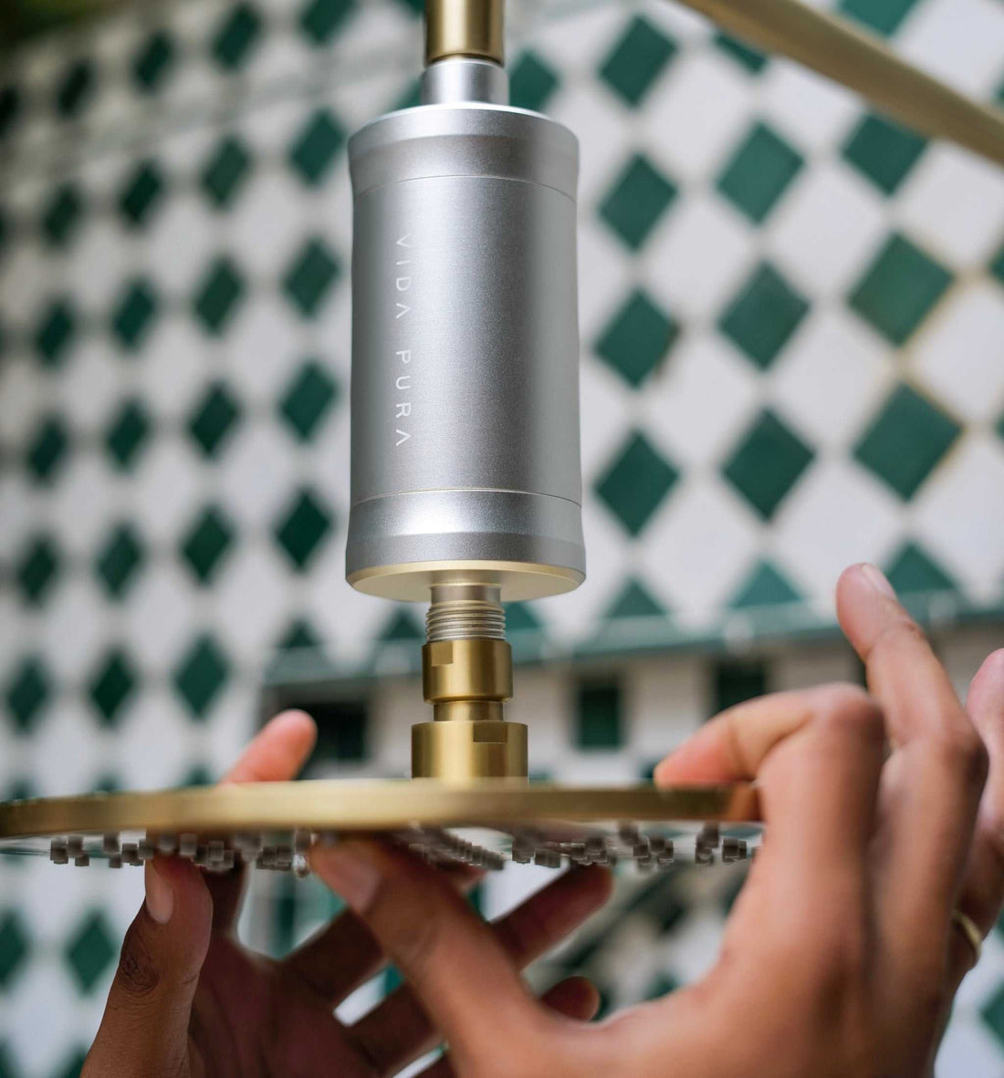 Vida Pura Shower Filter being installed onto showerhead